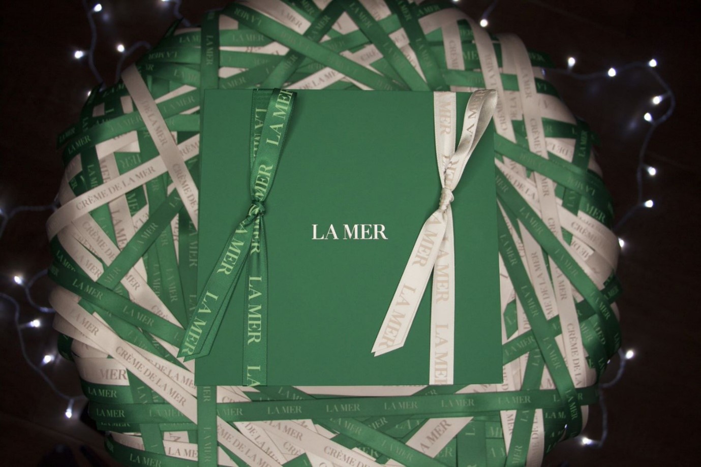 La Mer Green Packaging with Green and White Ribbons
