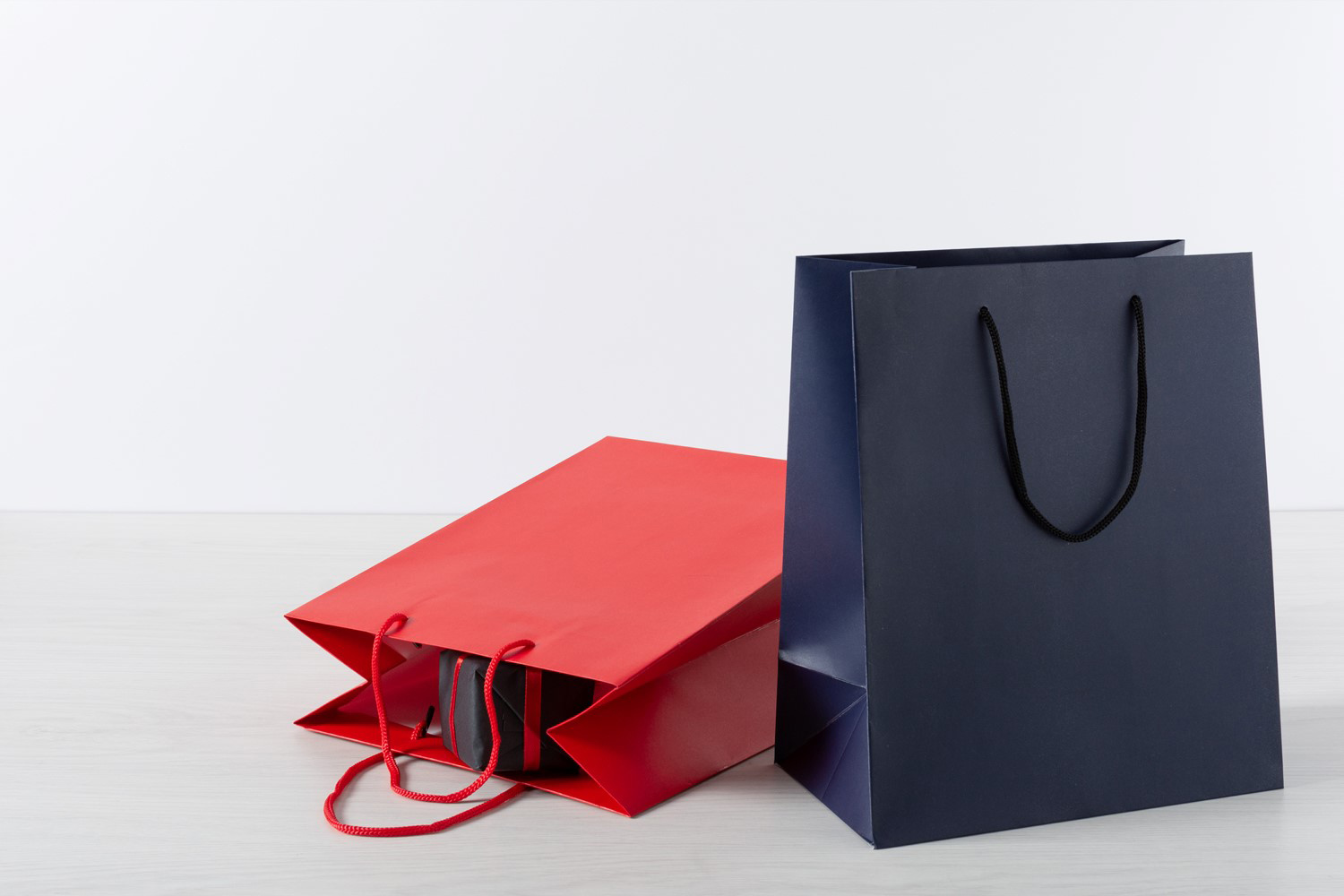 Red and Blue Retail Bag Packaging and Scarf