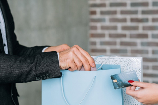 Customer Paying Salesperson for Items with Card