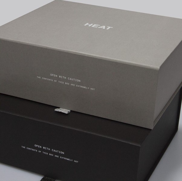 Heat Branded Grey and Black Boxed Packaging