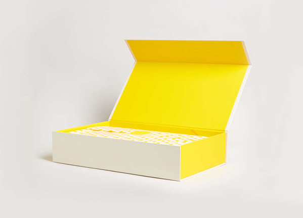 Selfridges Boxed Packaging Open to Show Yellow Inset Design