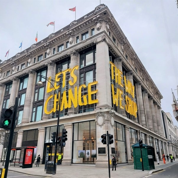 Selfridges Store Front in Oxford Street with Let's Change the Way We Shop Campaign